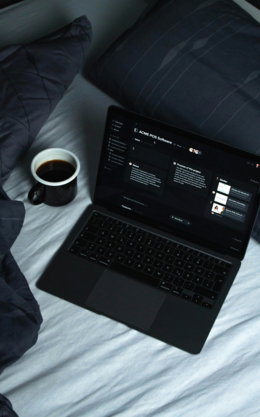 black-laptop-computer-on-white-textile.jpg black laptop computer on white textile